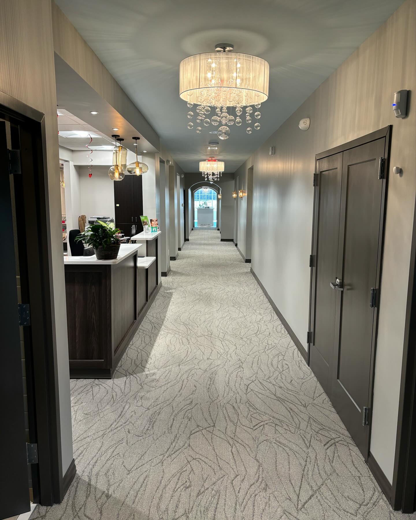 Dr Lordo standing in dental hallway in Columbus Ohio